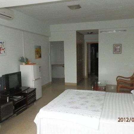 Xingfu Hotel Nanning Camera foto