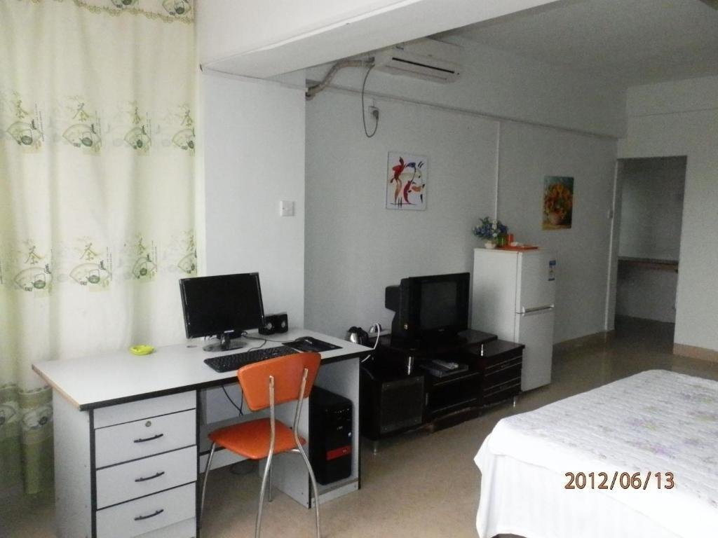 Xingfu Hotel Nanning Camera foto