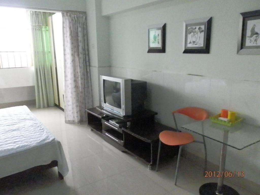 Xingfu Hotel Nanning Camera foto