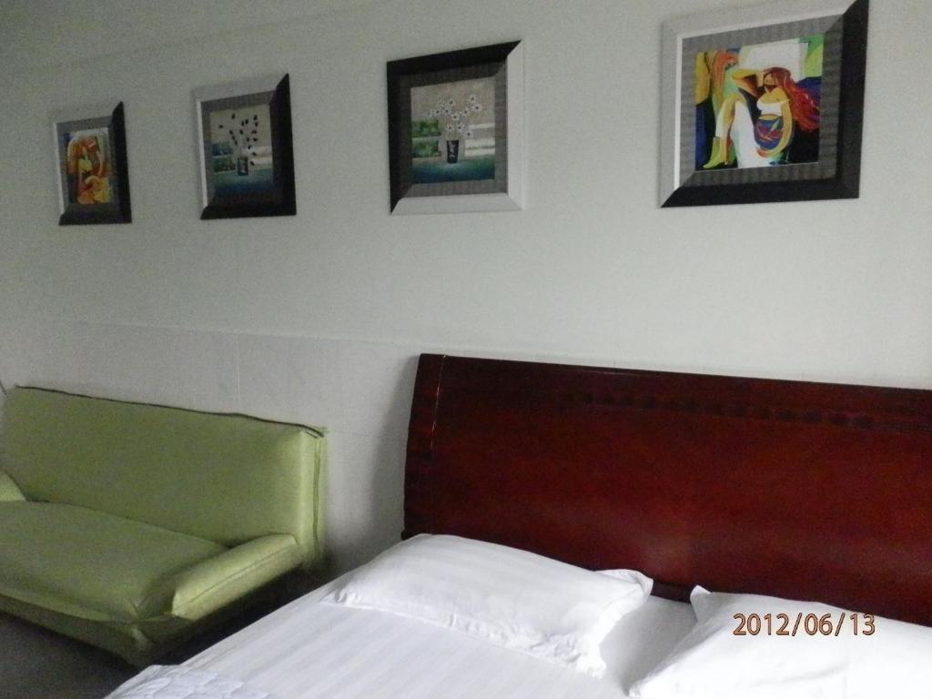 Xingfu Hotel Nanning Camera foto