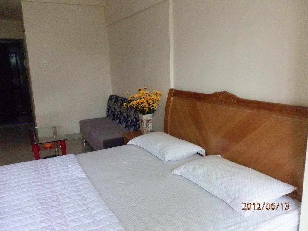 Xingfu Hotel Nanning Camera foto
