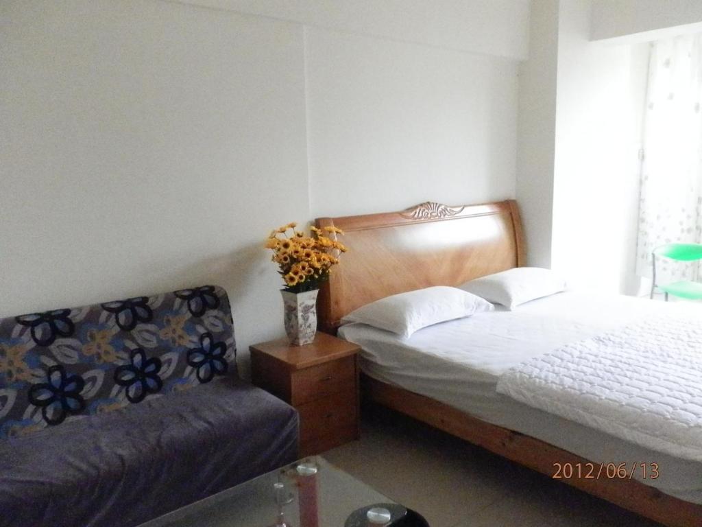 Xingfu Hotel Nanning Camera foto